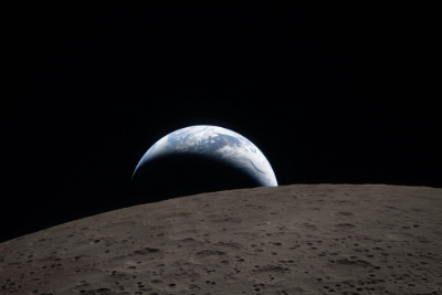 Earthset captured through the Orion spacecraft window at 6:41 p.m. EDT, April 6, 2026, during the Artemis II crew’s flyby of the Moon